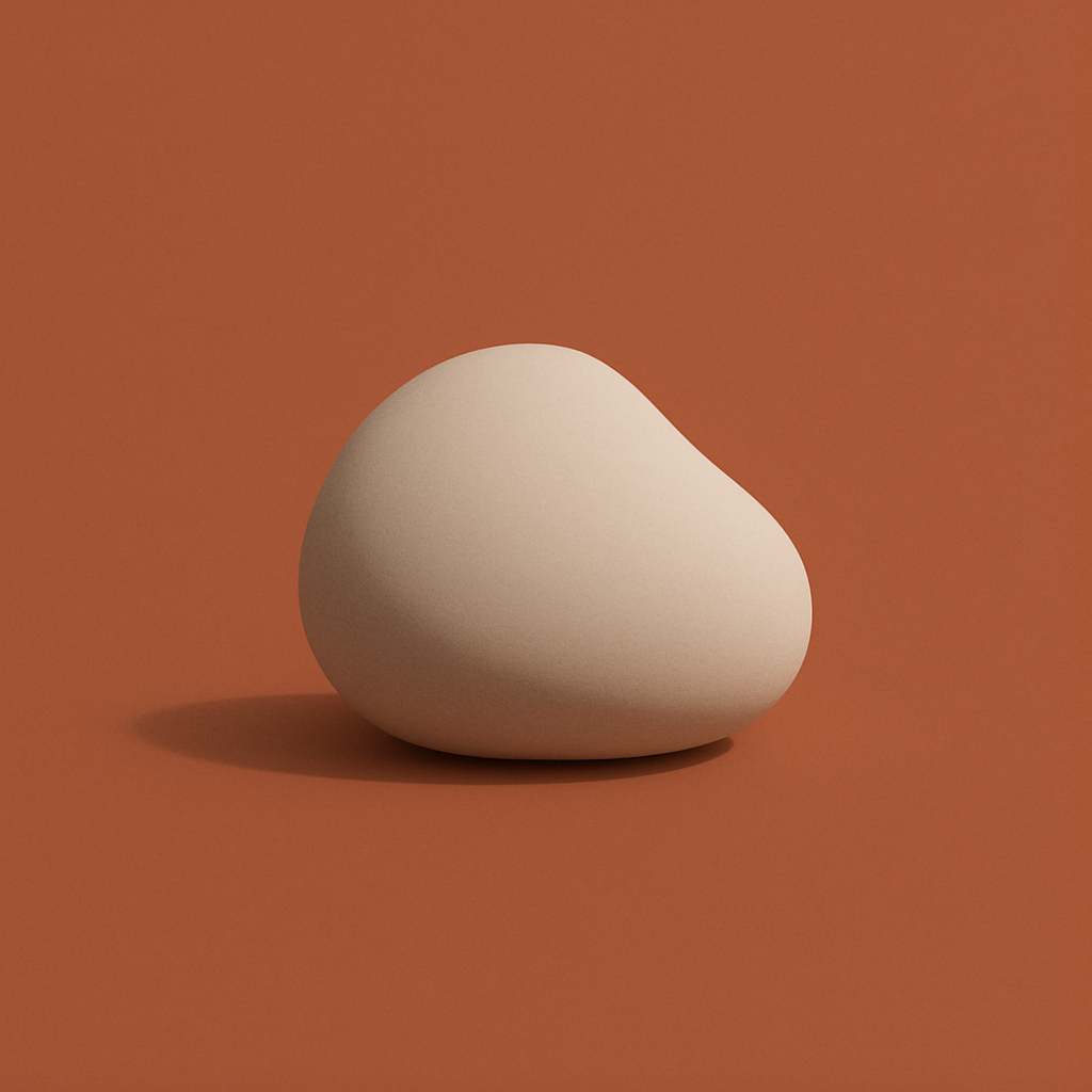 Minimalist stone shape on terracotta background